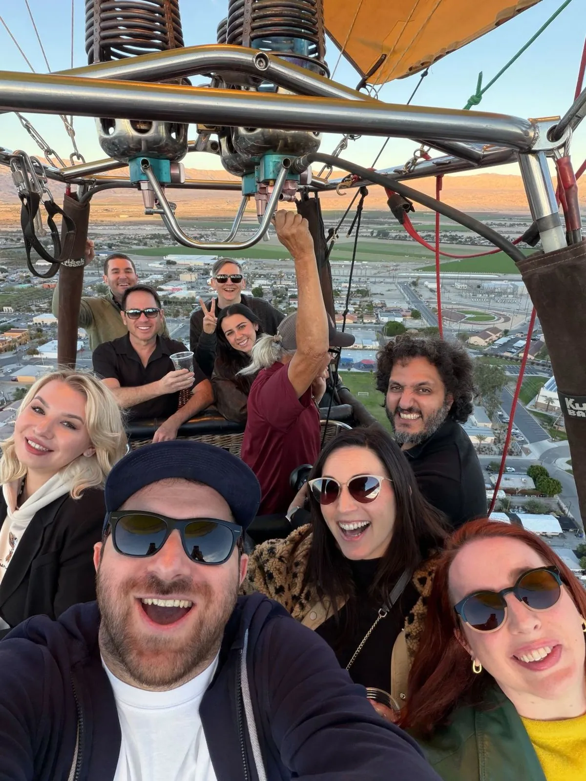 Group selfie in a hot-air balloon basket